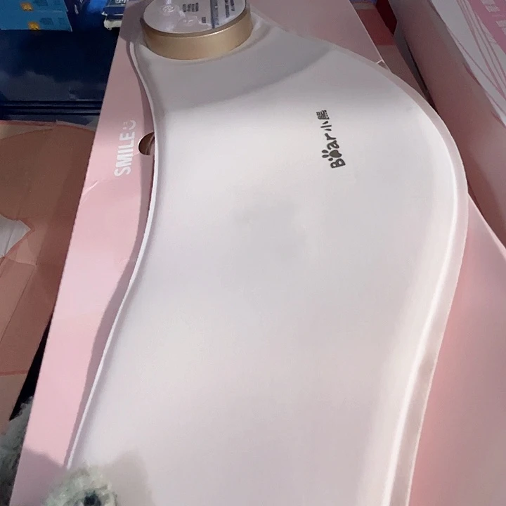 小熊加热暖腹按摩腰带。