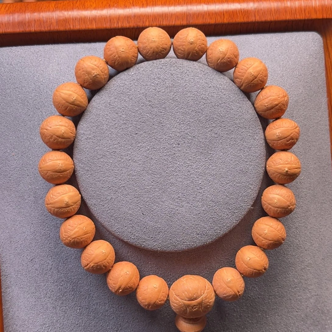 吊坠凤眼菩提12.6圆状玉华皮鼓眼手串