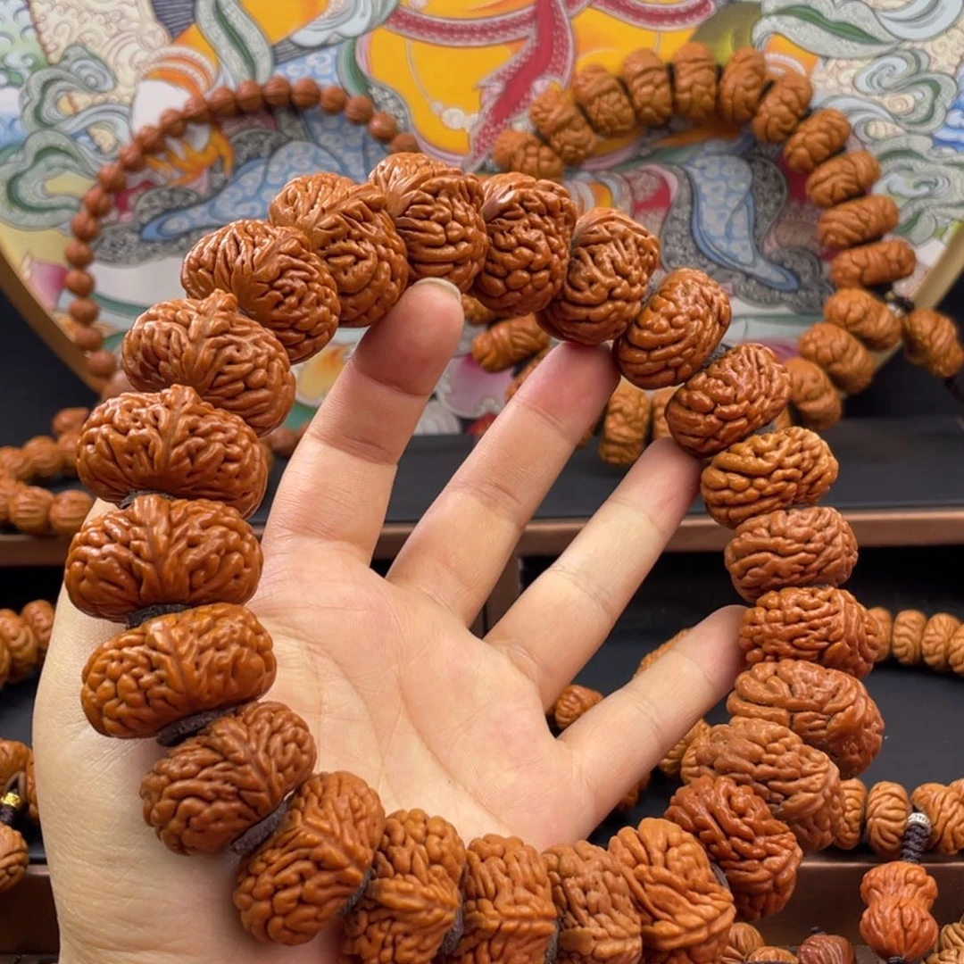 桃核手串龙纹桃核麒麟