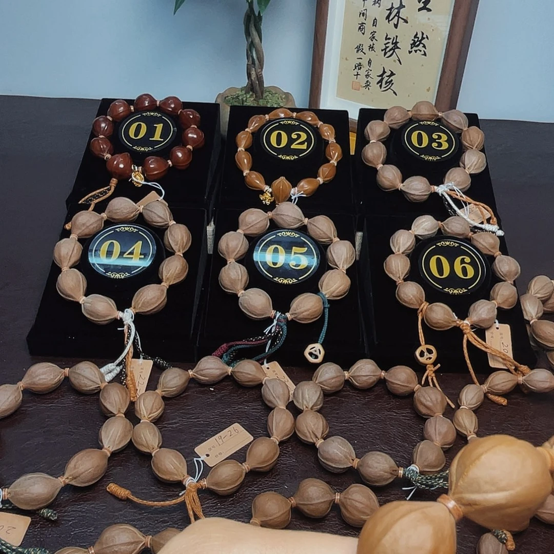 @***撑橄榄核手串梅林铁核20*27