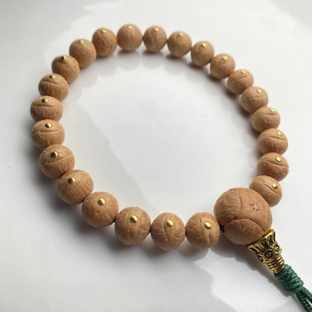 【Y0409】尼泊尔老树凤眼菩提10.1-10.3mm黄金尺寸 23颗籽 新籽油