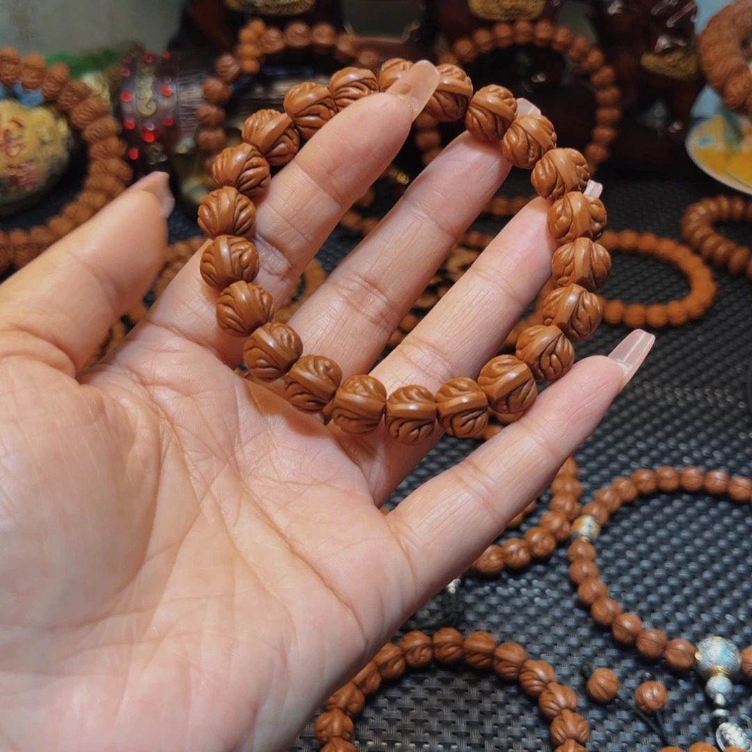 渔***行桃核手串13顶级双脊龙单圈