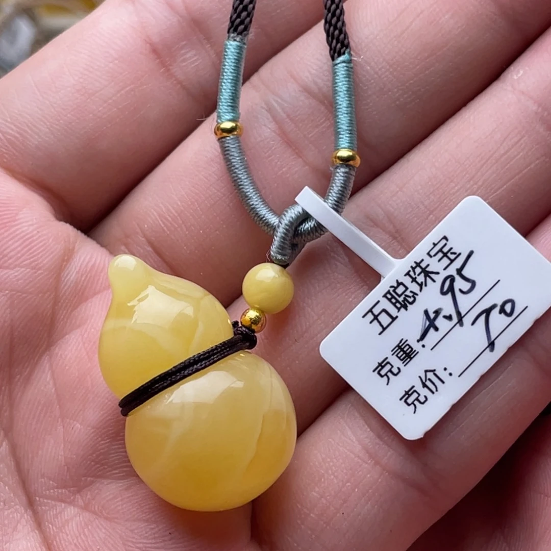 琥珀珠宝奇石未镶嵌糖****?