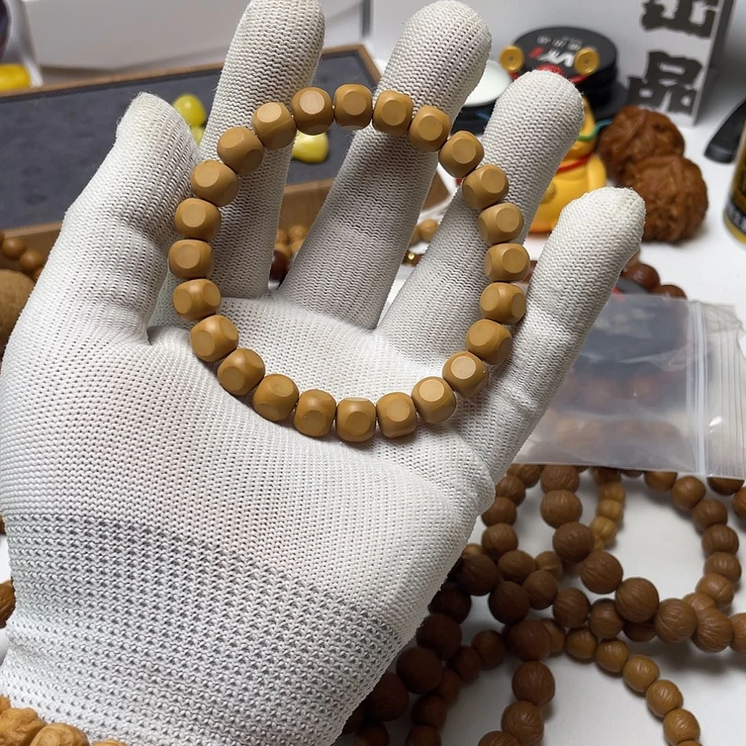 张***黑吊坠猴头核桃六方单圈