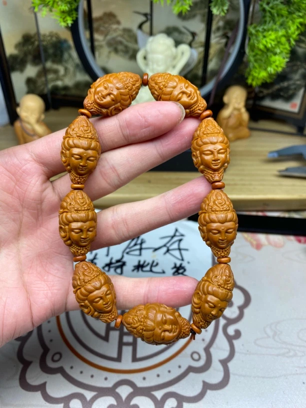 橄榄核雕工艺手串宇观音佛上佛