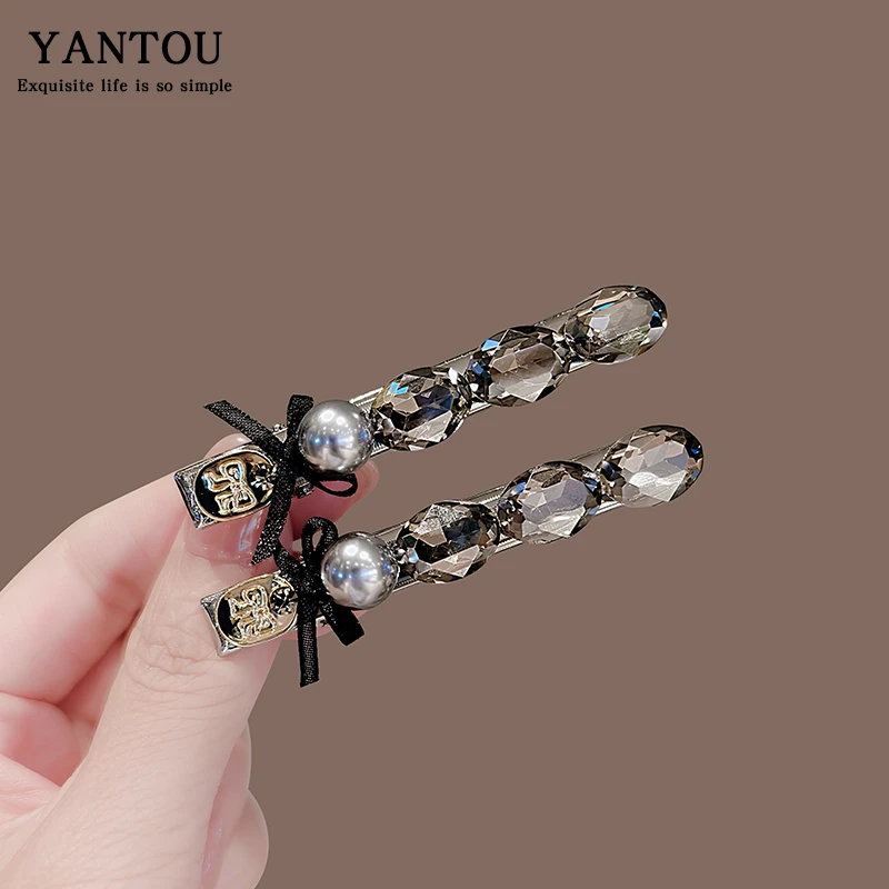 水钻黑色蝴蝶结侧边刘海发夹女前额头饰一字夹边夹2025新款高级感