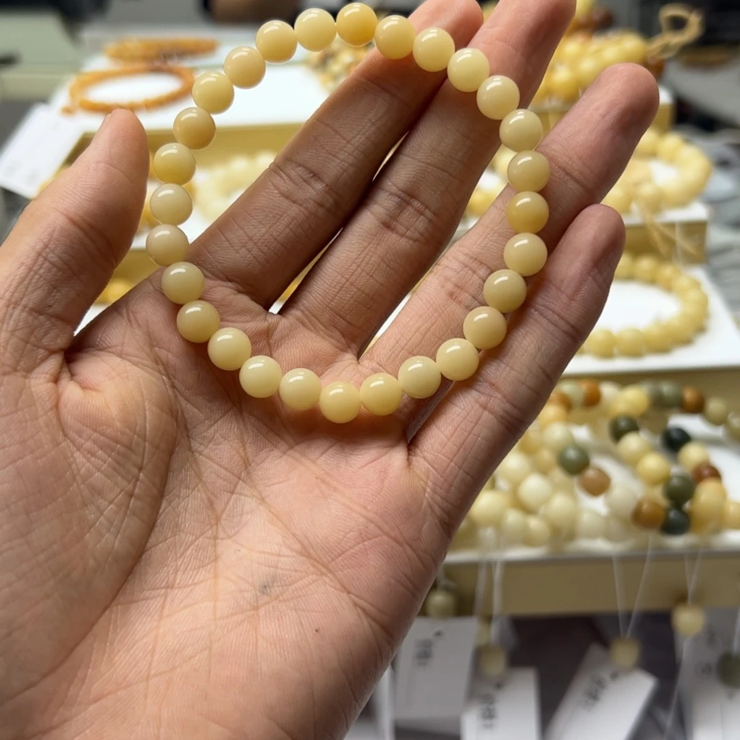 玥***菩提根/象牙果手串8×7圆珠月