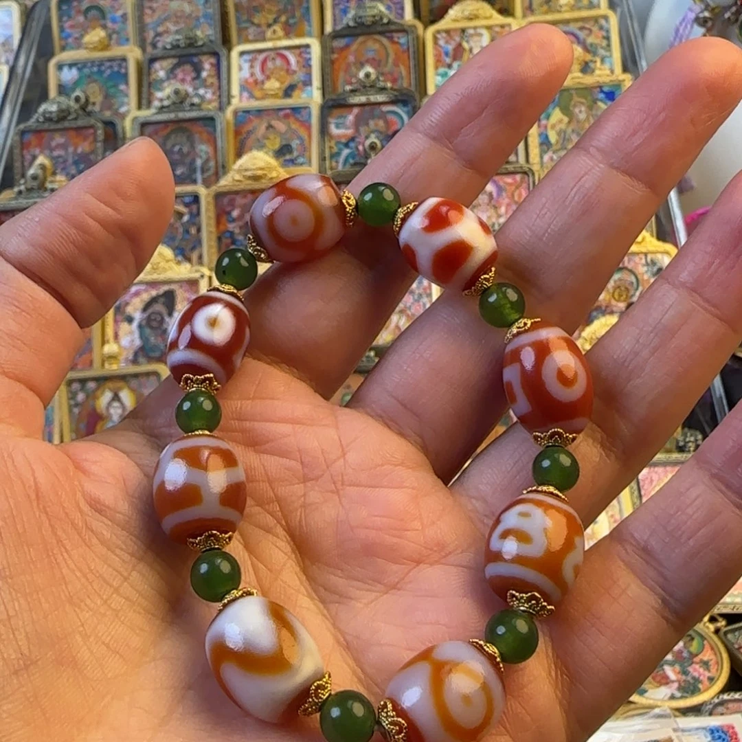 汤***粑吊坠红肉手链热贡唐卡