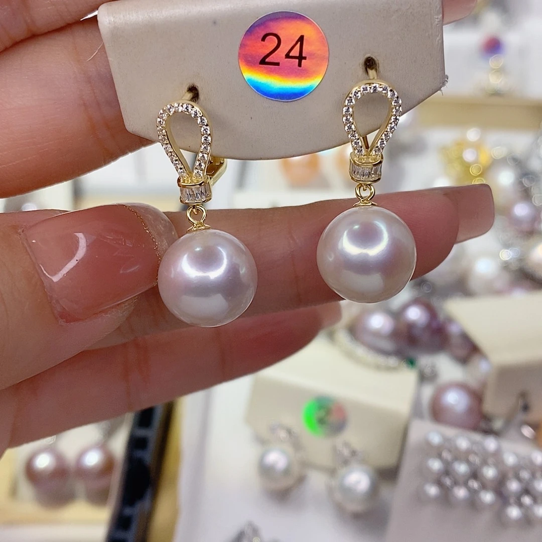 荣***光淡水珍珠耳饰银S925镶嵌