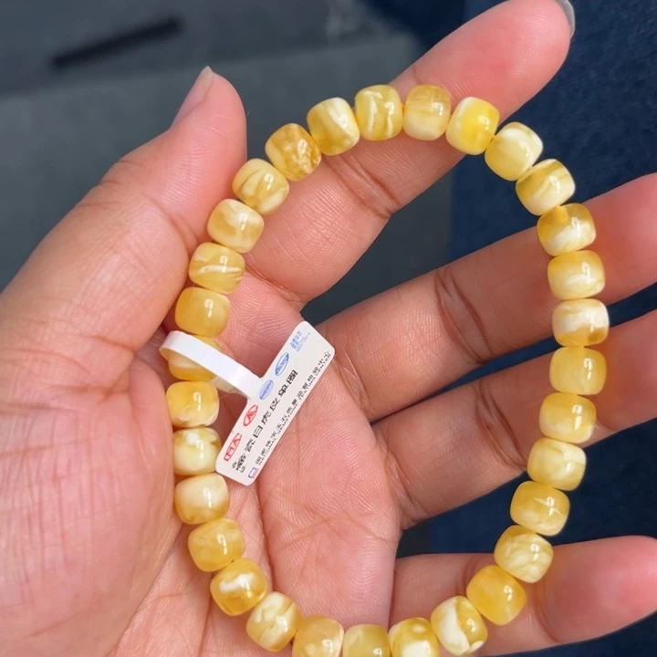 琥珀未镶嵌珠宝奇石M94号7.5+金瓷白妖花