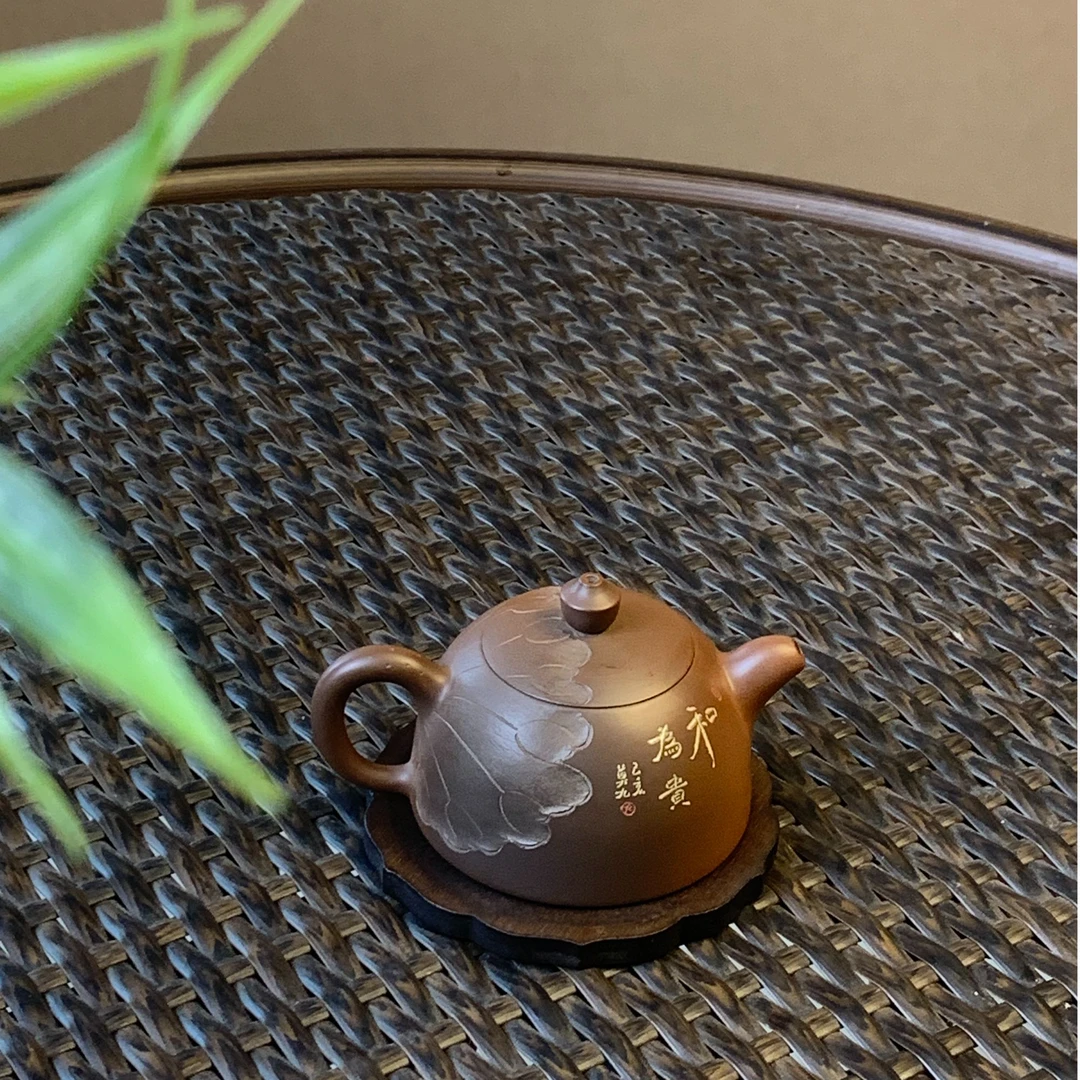 千年古陶半月壶《和为贵》