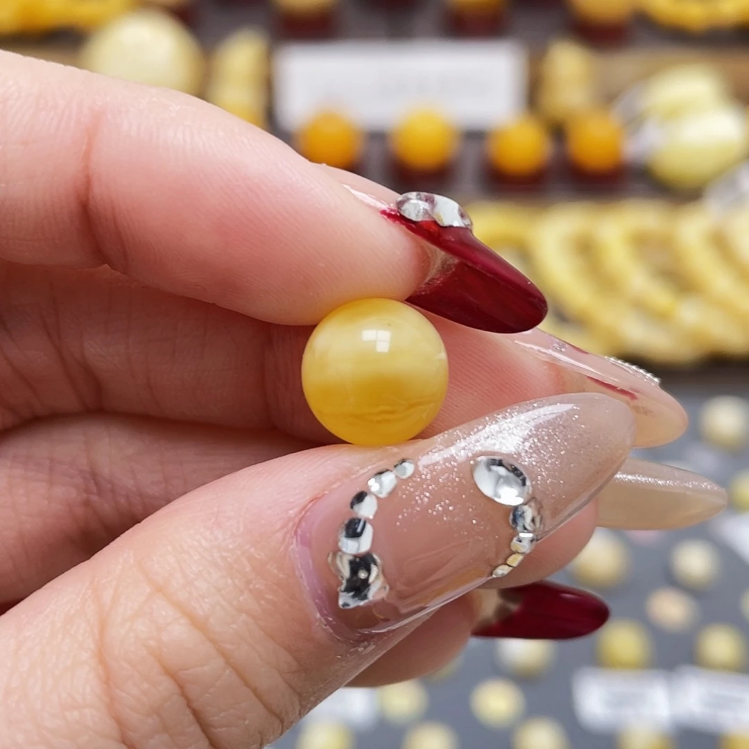 琥珀裸石未镶嵌蜜蜡圆珠10.3mm微瑕