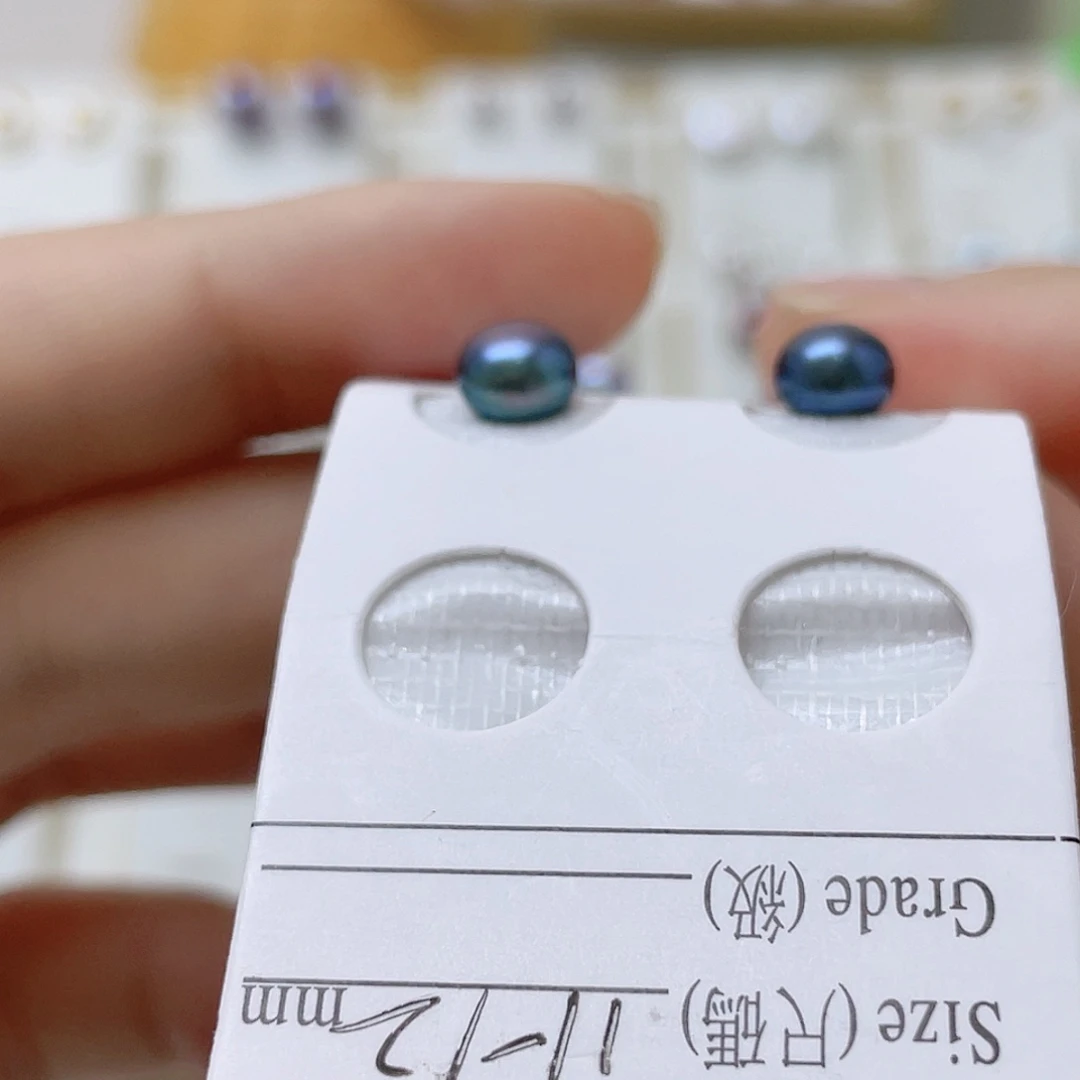 ઇ***ଓ银S925镶嵌耳饰淡水珍珠