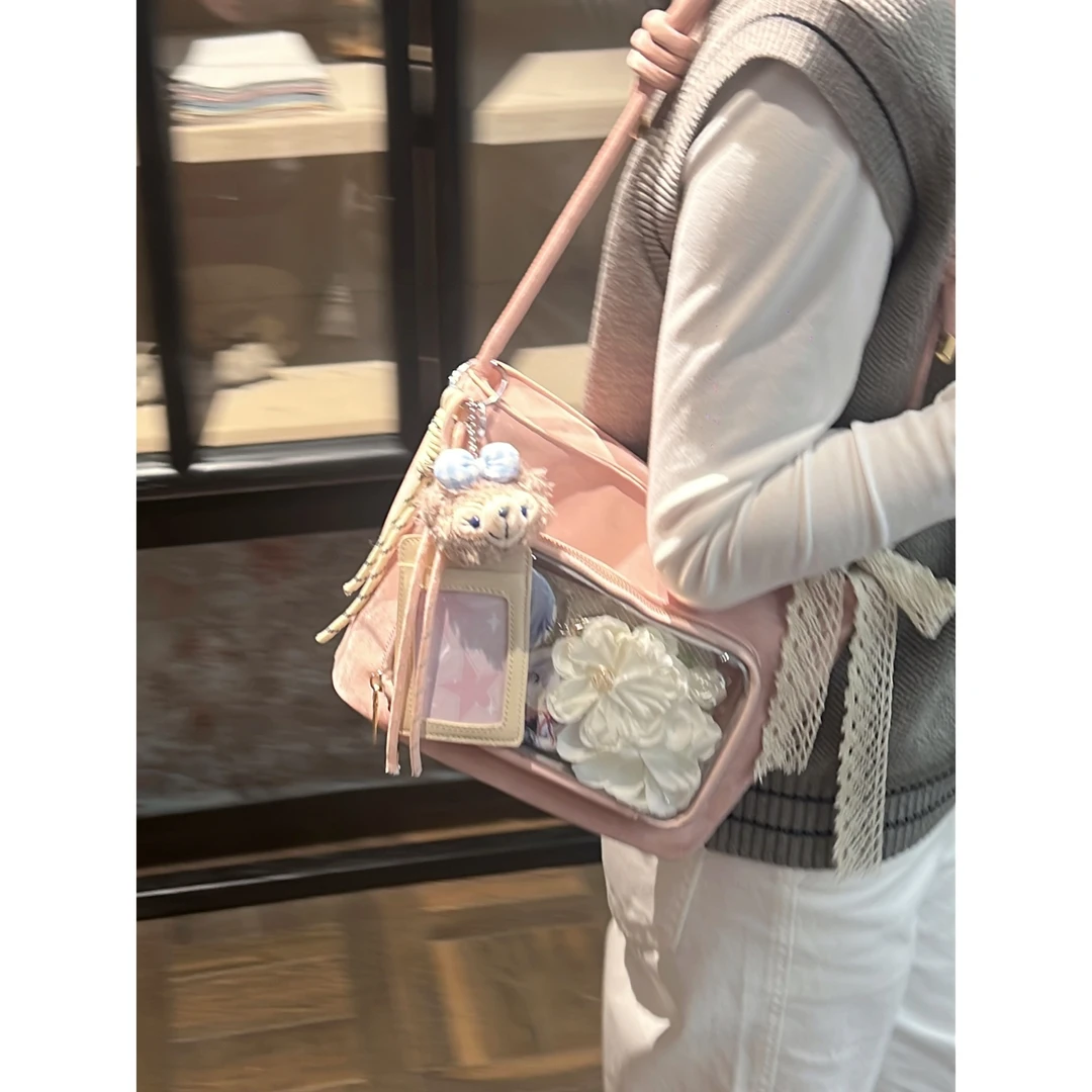 艾米兔女包简约日常百搭2025新款痛包通勤休闲单肩斜挎水桶包