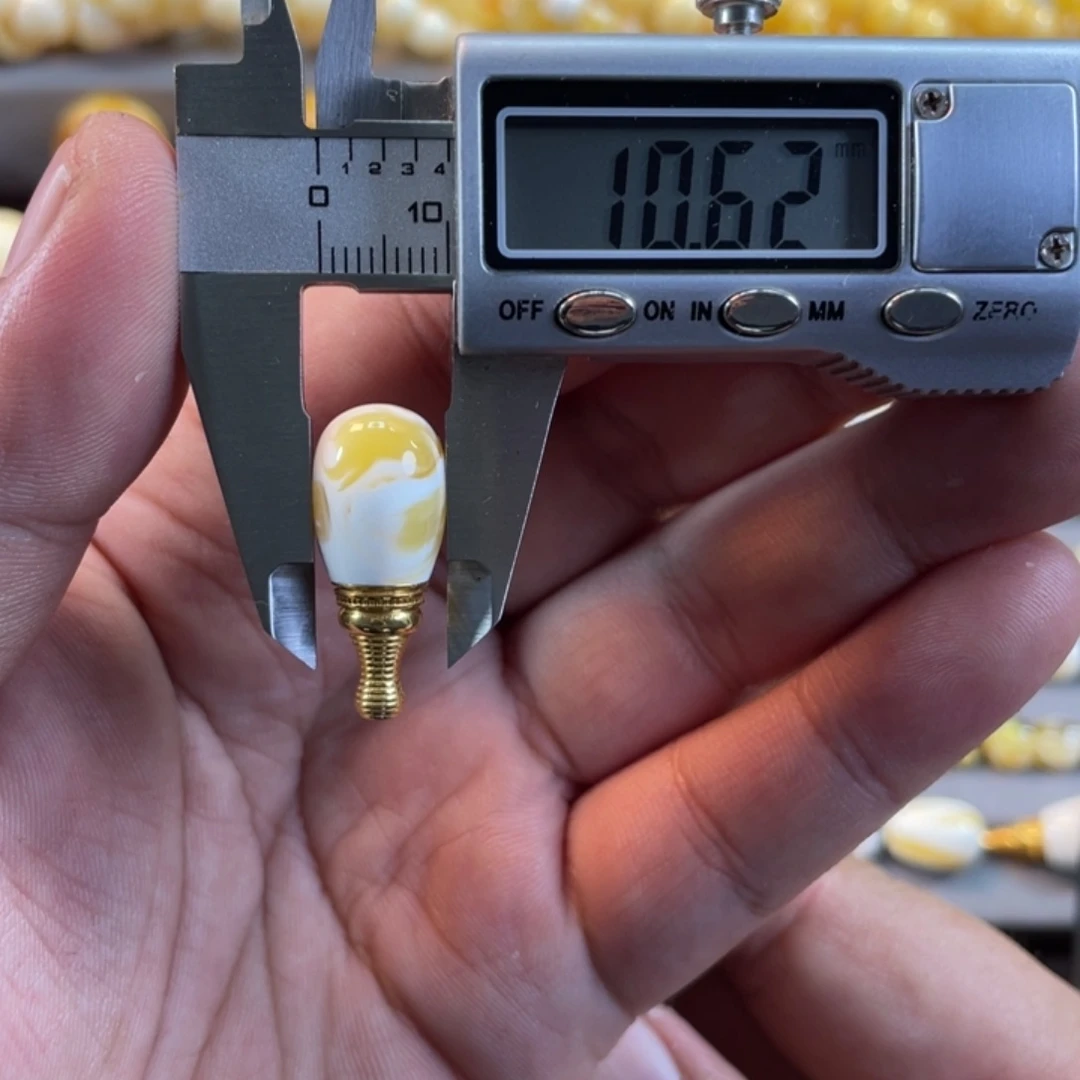 蜜蜡裸石未镶嵌今****晴金漆白荧光分体三通