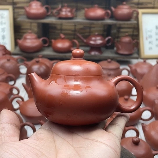 杰****徊潮州朱泥手拉壶荣天壶