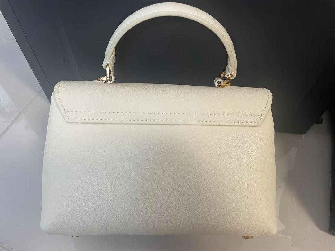 手拿包气质时尚休闲百搭女士黑色真皮简约小塞手提包