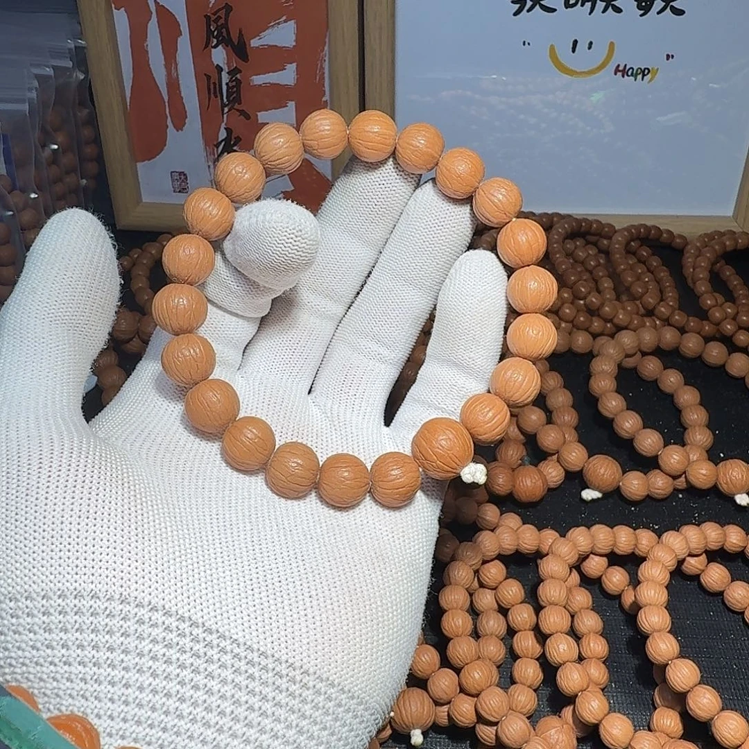 梁***博核桃原皮原色原生态聚宝盆12