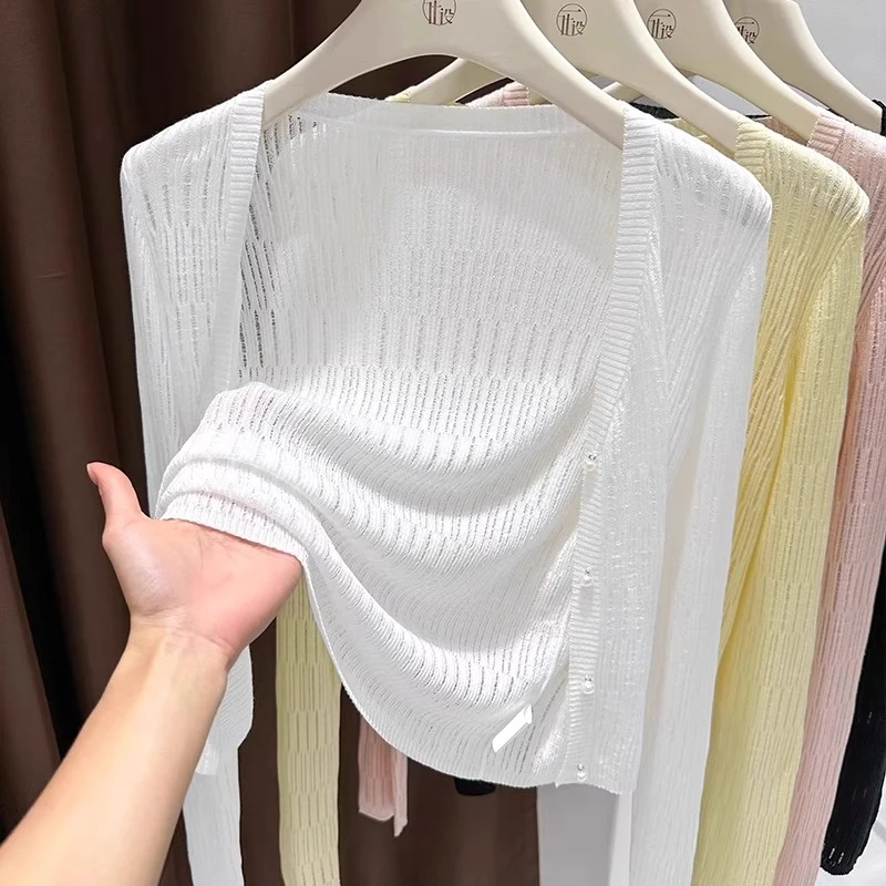 芯娇晴镂空长袖针织开衫女夏季新款薄款防晒配吊带裙外搭披肩上衣