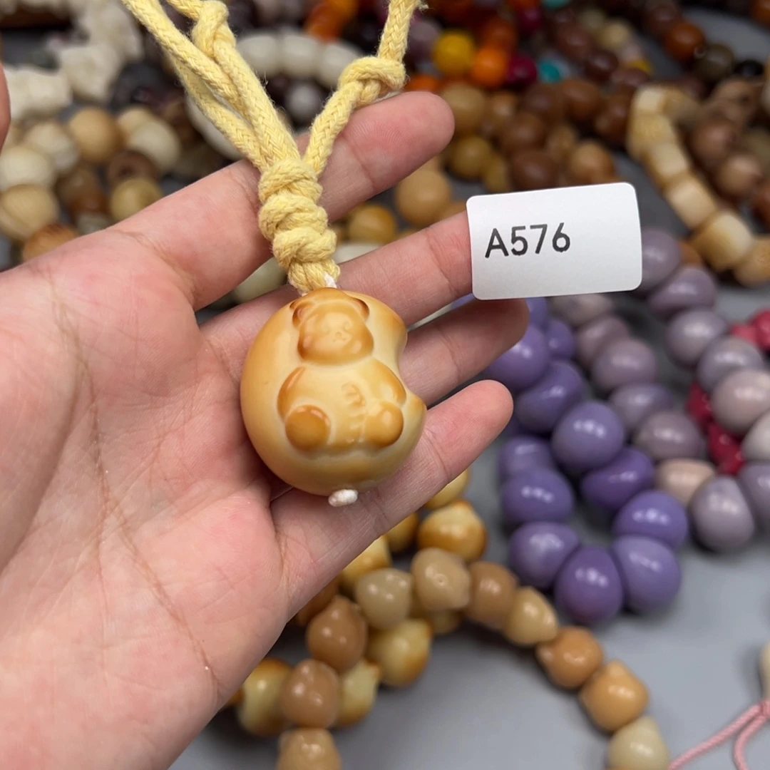 吊坠菩提根/象牙果A576月亮28-33瑕疵一串