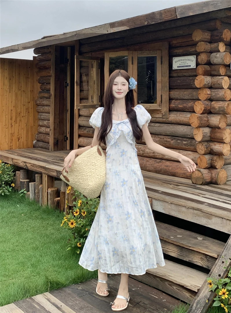 温柔风碎花短袖连衣裙女2025夏季新款木耳边收腰显瘦A字茶歇裙子