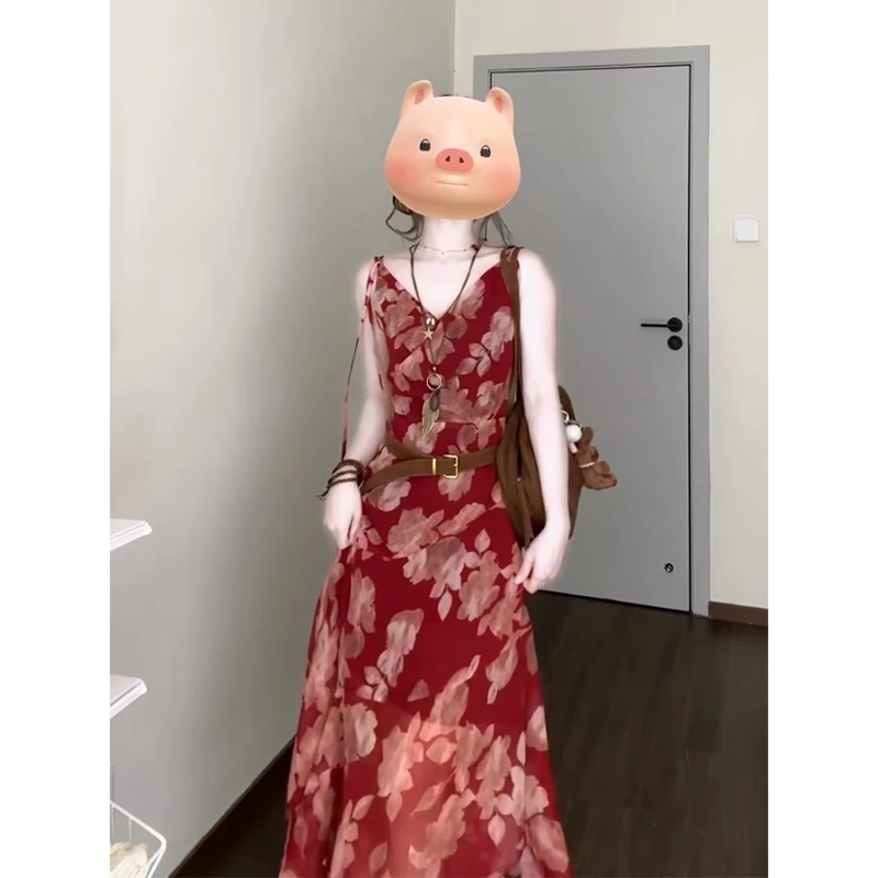 吊带连衣裙女2025夏季新款法式气质收腰显瘦印花不规则中长款裙子
