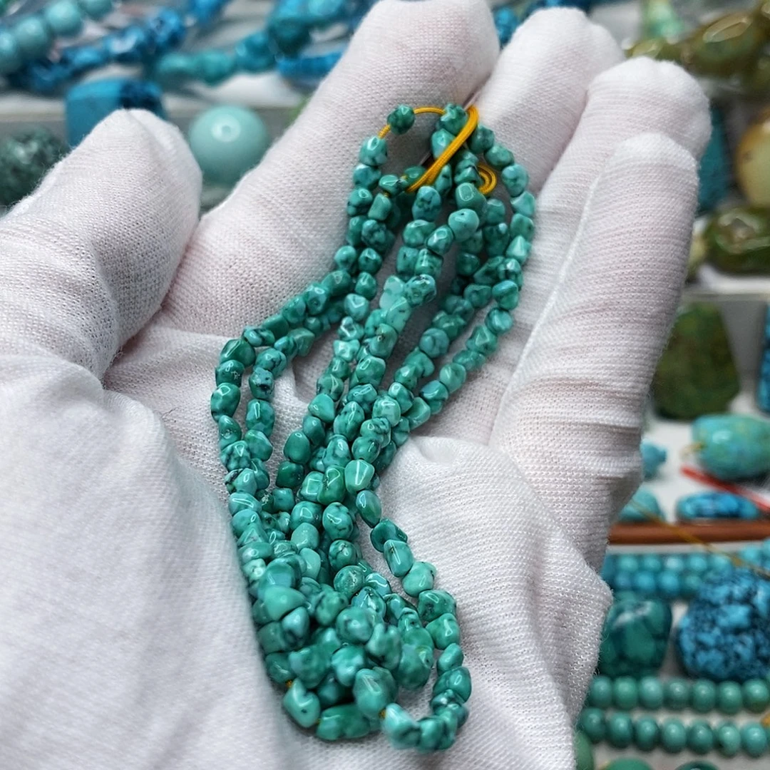 陆****绿松石未镶嵌天然原矿 带武汉地大证书