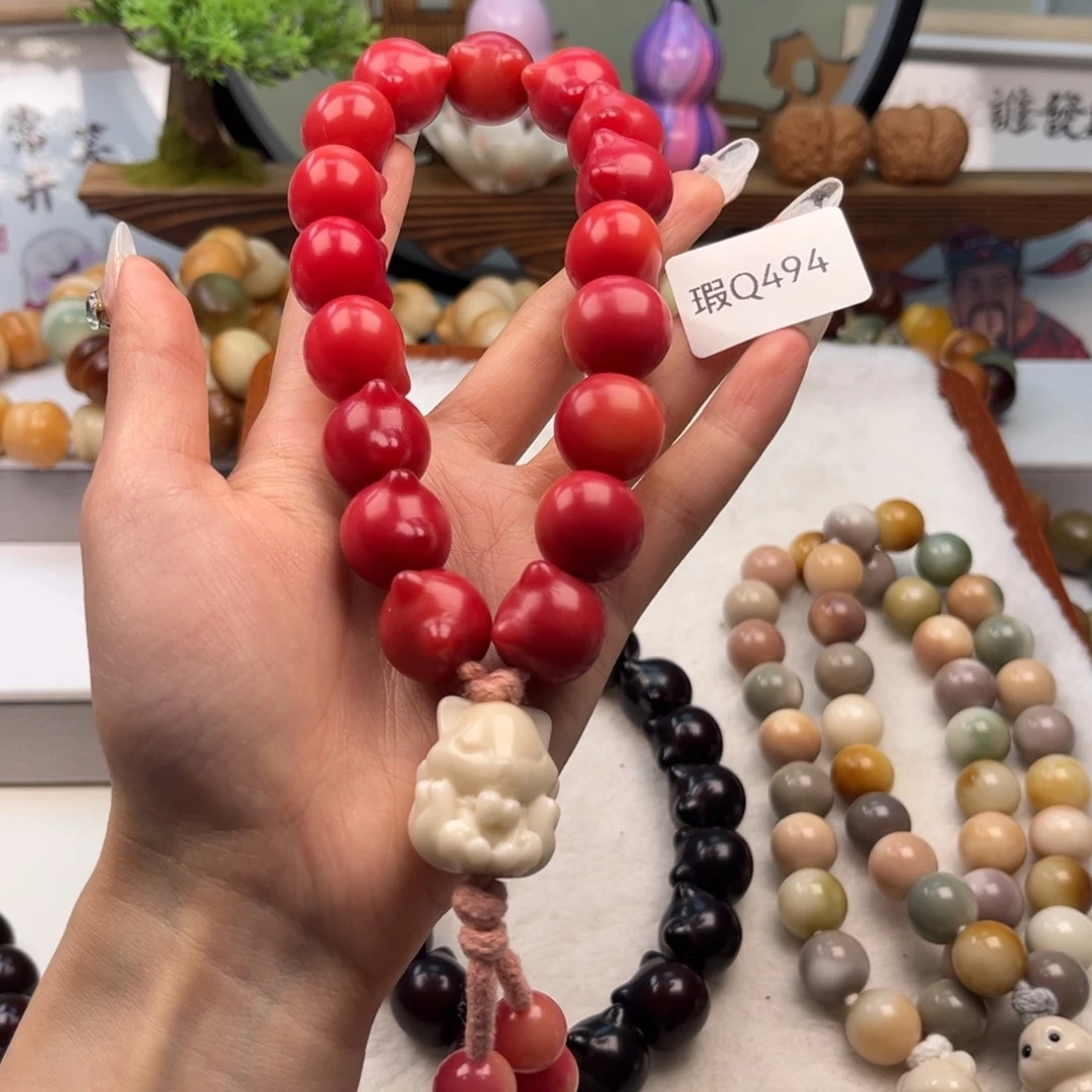 菩提根/象牙果手串生**限16+mm瑕猫头手持一串q494