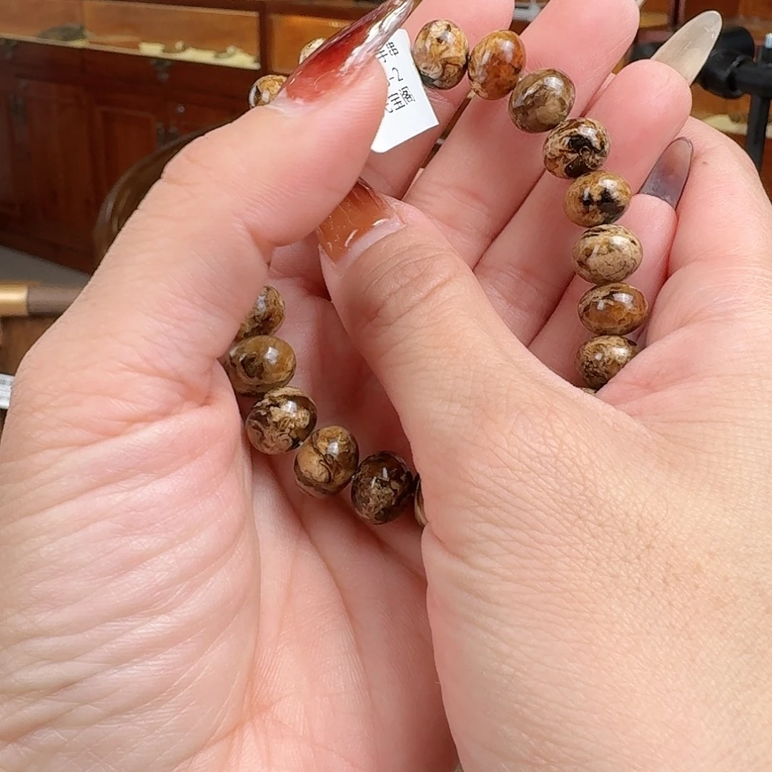 军***亮琥珀未镶嵌手串抚顺琥珀 干白花10M