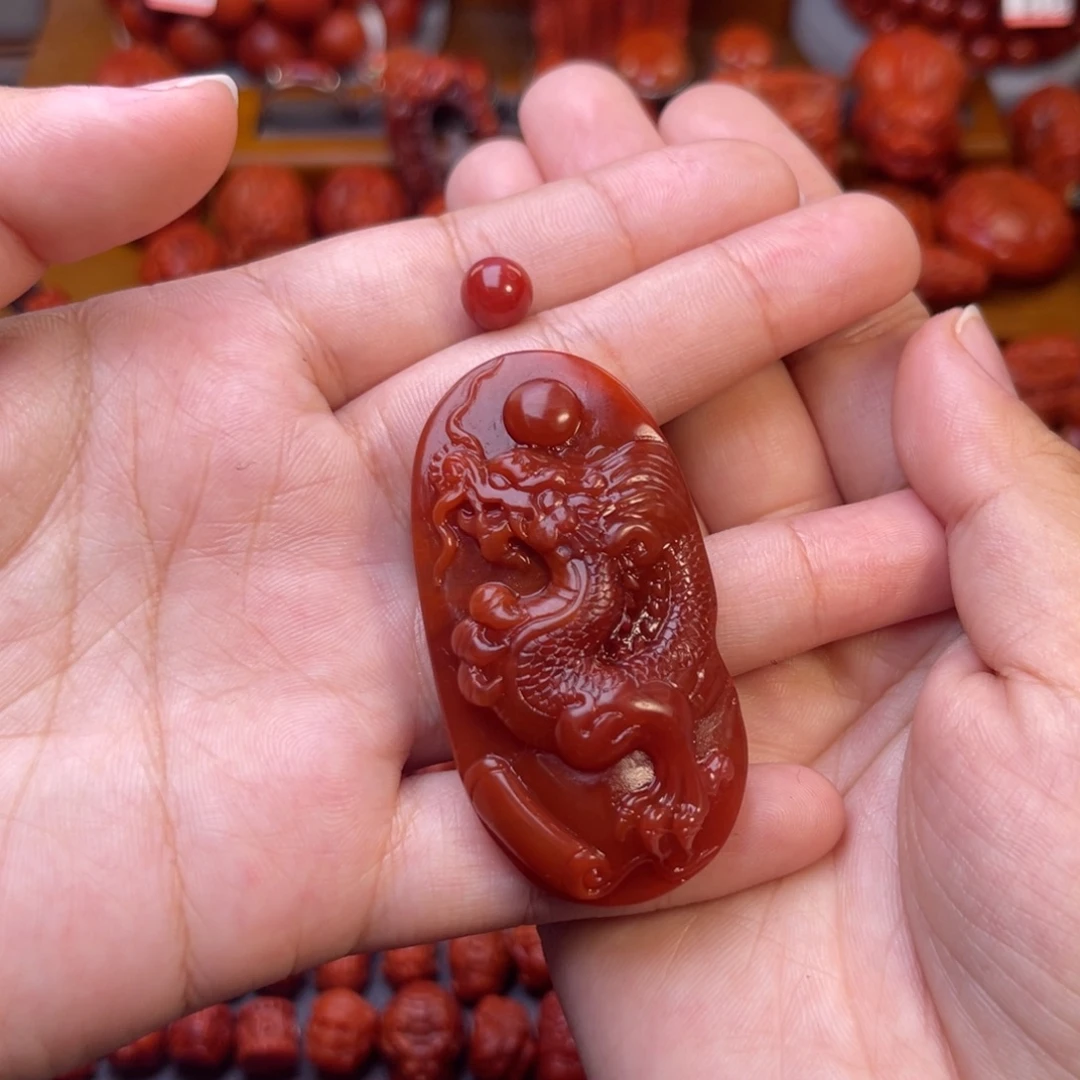灿***帆南红玛瑙未镶嵌保山精品牛血色龙牌