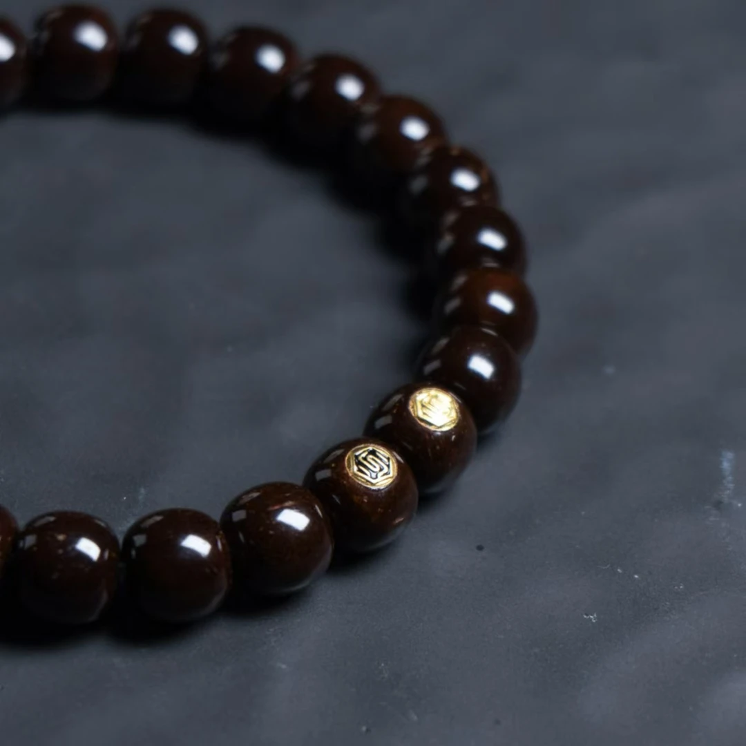 原生态印尼黑棕椰蒂9-8手串XY010