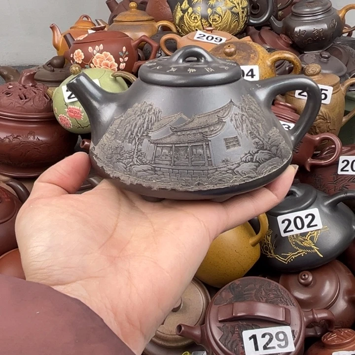 茶壶紫砂壶嘴刮了