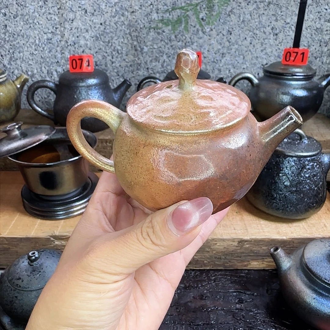 壶O****兔建水紫陶柴烧壶