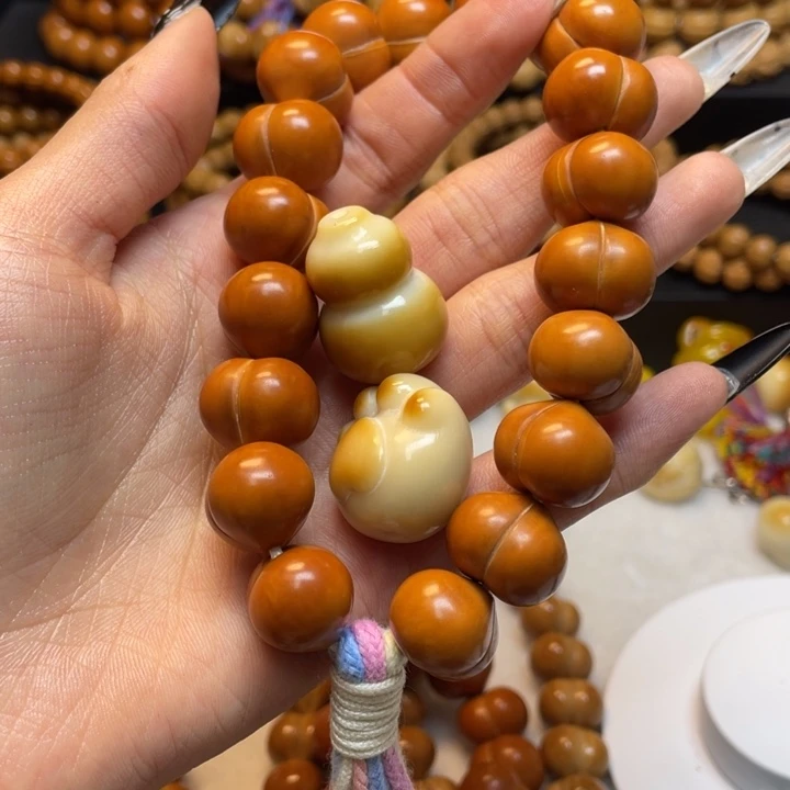 ໑****手串猴头核桃微瑕屁桃加葫芦和猫爪