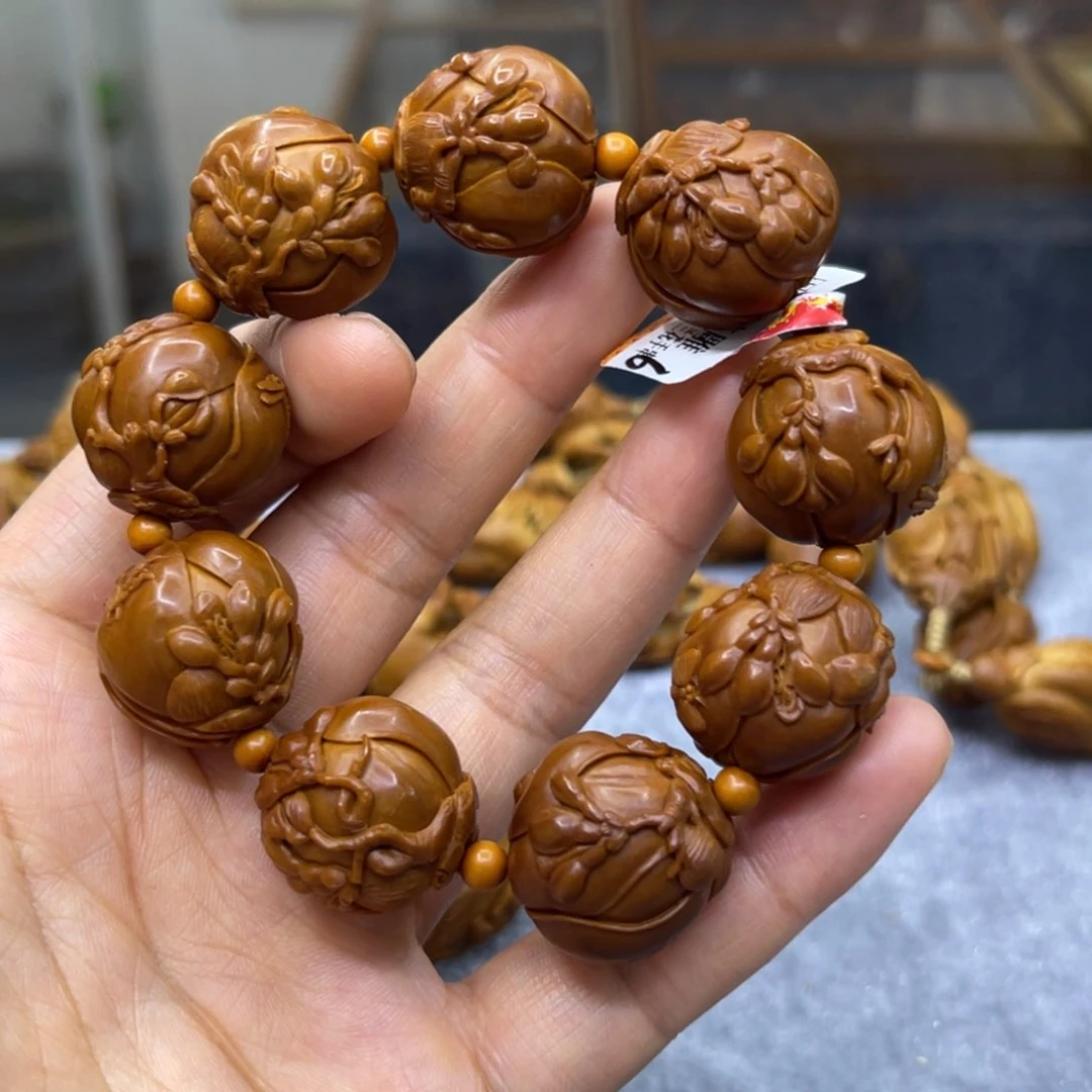 橄榄核吊坠玉兰花