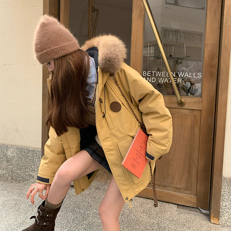 黄色羽绒服女冬2025新款设计感大毛领工装派克服炸街白鸭绒厚外套