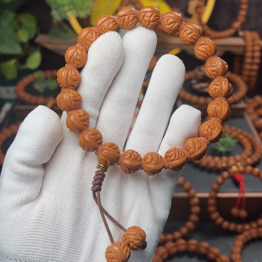 吊坠桃核1.3小金豆手持