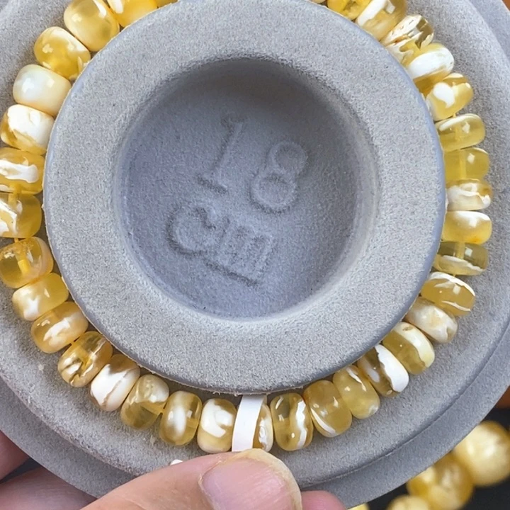 琥珀珠宝奇石未镶嵌8+俄料金瓷白妖花