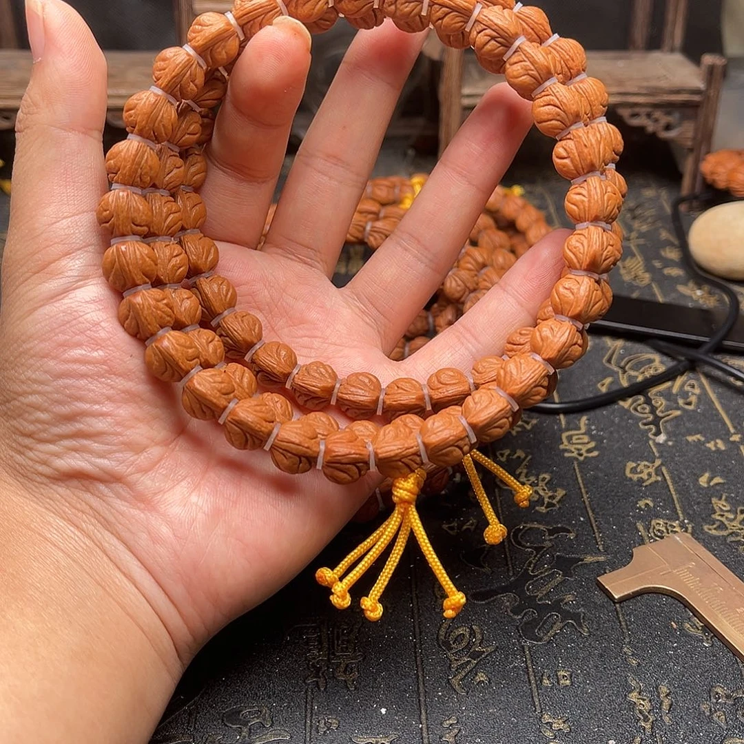 桃核吊坠玉龙手持