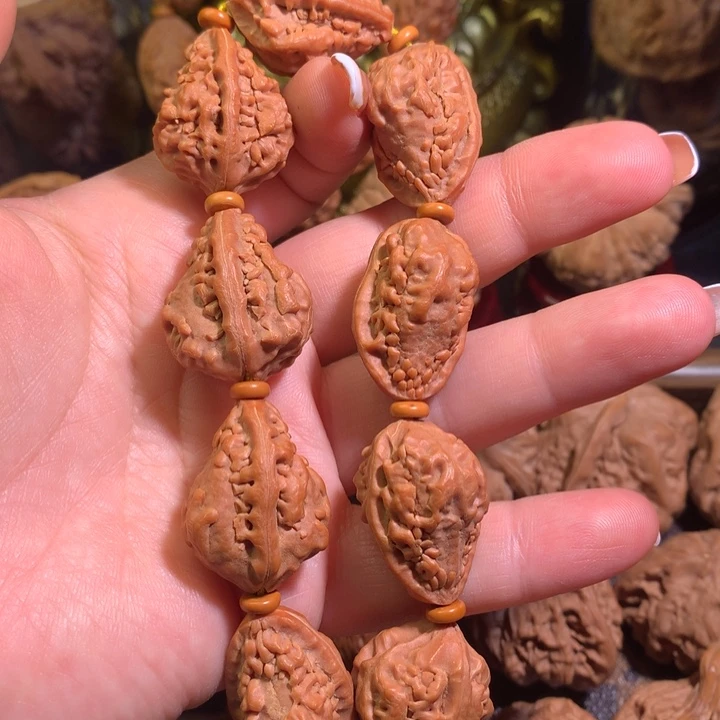文玩核桃吊坠麒麟角手串
