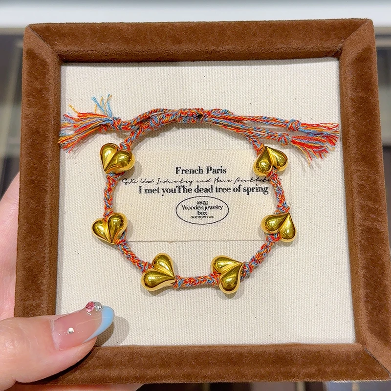 海上罗孚黄金屁桃编织手绳女999足金算盘珠红绳手链生日礼物