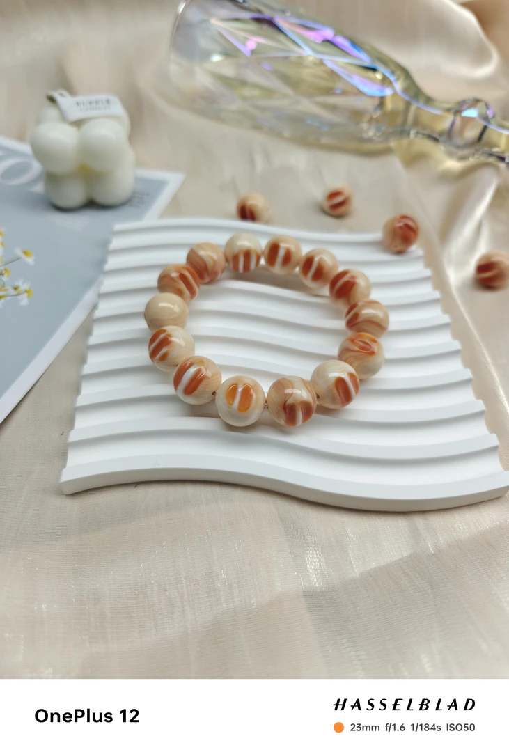 天然海南万宝螺海贝名螺散珠带血槽绿龙晶紫鲤云母DIY配件男女散