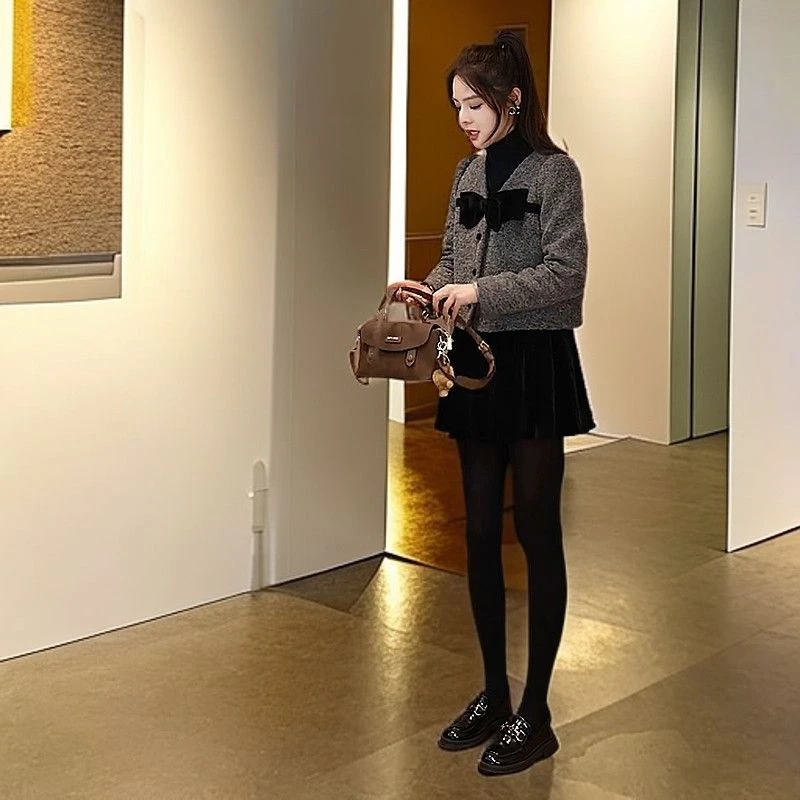 入秋一整套女装2025新款韩版蝴蝶结设计感外套百搭简约短裙两件套