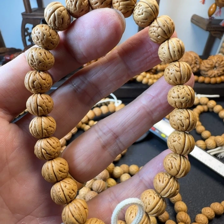 用***生桃核手串桃核手串