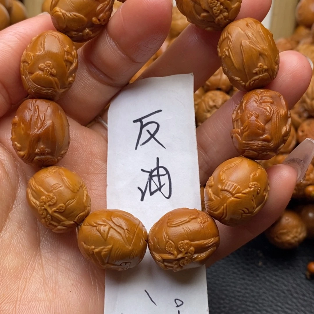 手串橄榄核鸽子蛋山水