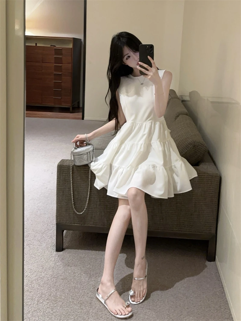 法式甜美少女风性感镂空露背无袖连衣裙纯欲气质修身显瘦蓬蓬短裙