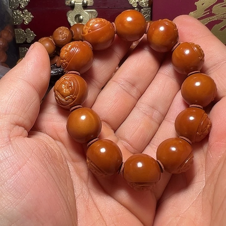 ℒ****橄榄核手串/手链1.7光珠色差横财