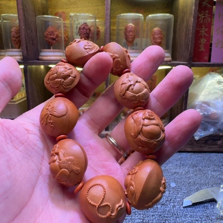 骑***京橄榄核吊坠啦啦啦
