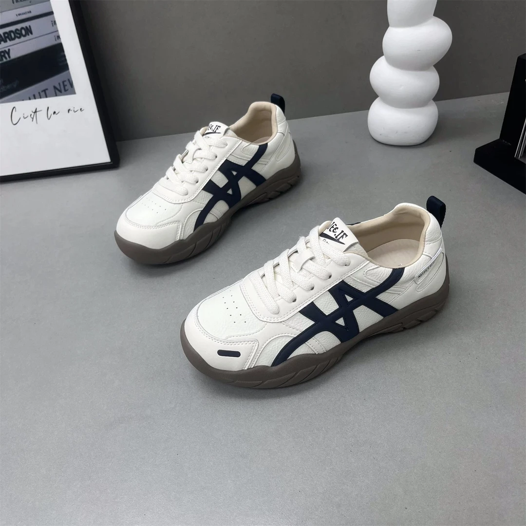 306–67时尚运动休闲小白鞋软底全皮防滑德训板鞋女