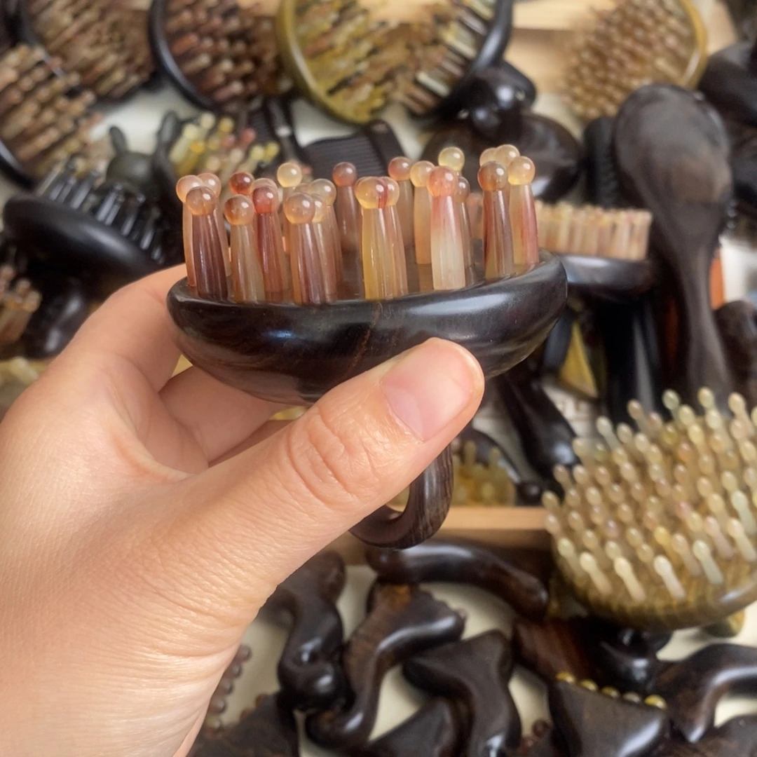紫光檀粉齿按摩梳子